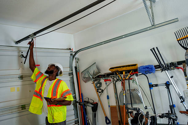 Professional Garage Door Installation technician working in Shelburne Falls, MA